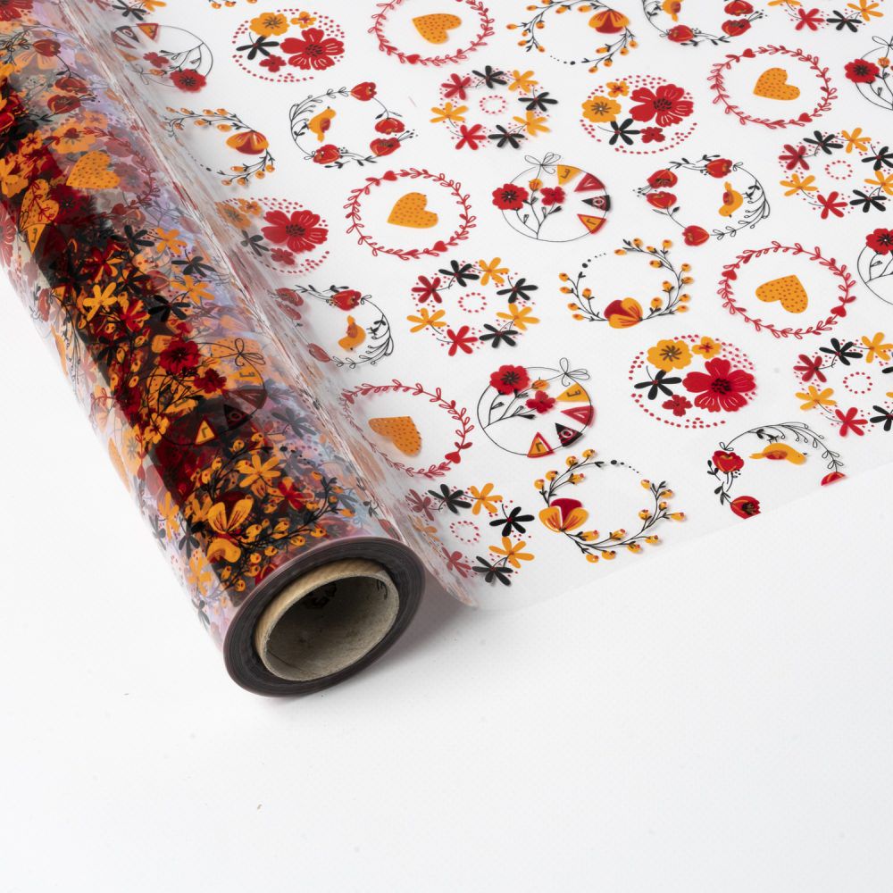 Papel de Regalo Polipropileno Transparente con Corazones y Flores